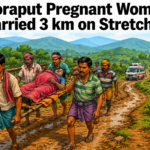 Family members carrying a pregnant woman on a stretcher through a rural path in Koraput district.